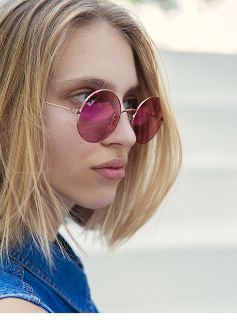 Ronde Ray-Ban Zonnebril in Bruin Montuurkleur met Roze Lenzen voor Dames.